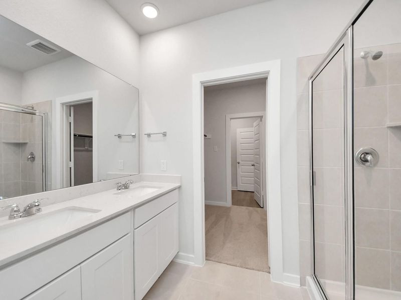 Furnished interior view inside a new home in Caney Creek Place, Conroe (Image 11).