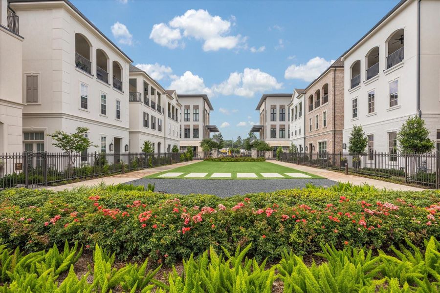 Green space conveniently connecting residential to restaurants and shops by pedestrian gates.