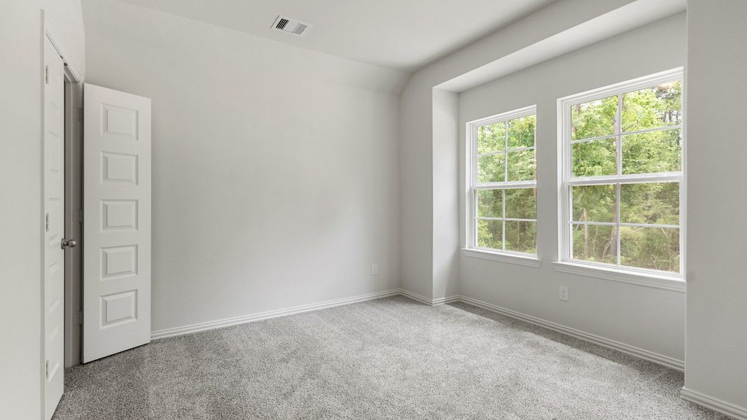 Representative furnished interior of a home built from the Benchmark by Brightland Homes in Bridgeland Creekland Village, Cypress (Image 15).