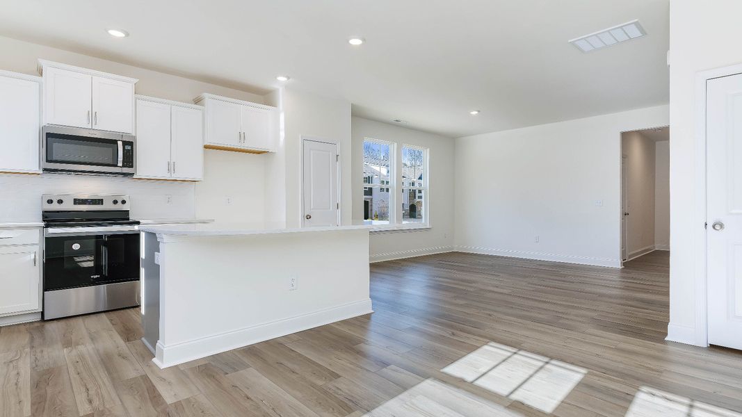 Furnished interior view inside a new home in Battle Bridge, Raleigh (Image 5).