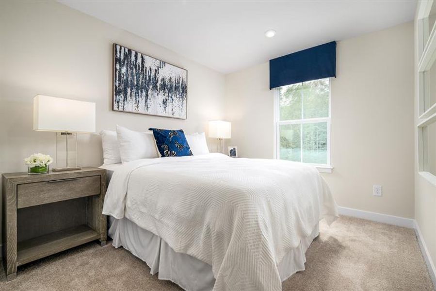Representative furnished interior of a home built from the Schuman by Ryan Homes in Stowe Branch Townhomes, Charlotte (Image 18).