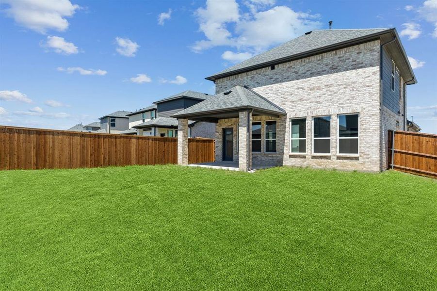 Front exterior of a new home in Santorini, Seagoville, TX, highlighting curb appeal (Image 22). Front exterior of a new home in Santorini, Seagoville, TX, highlighting curb appeal (Image 22).