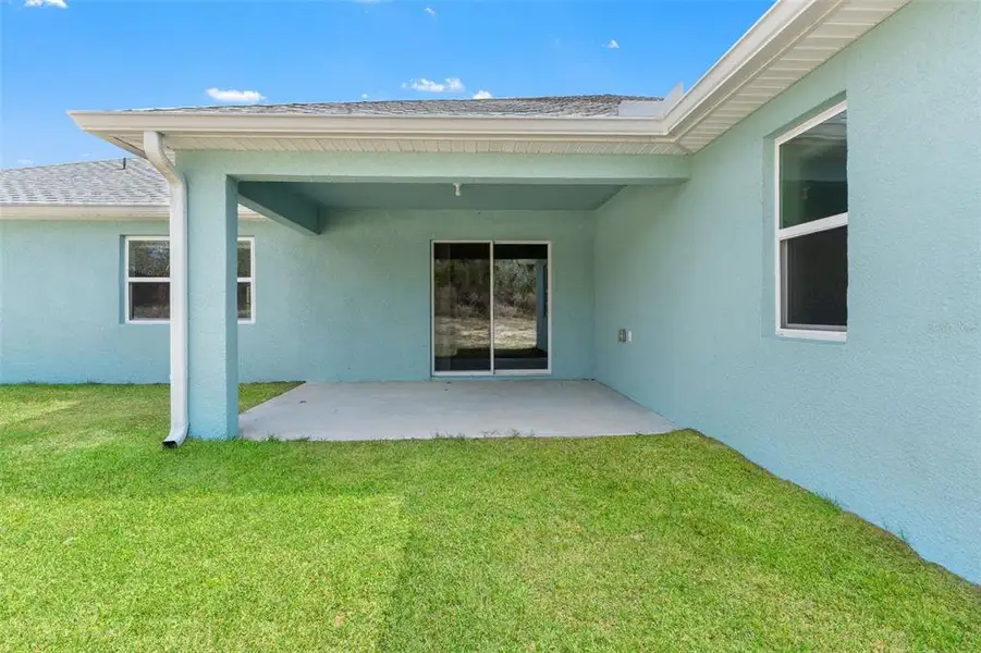Exterior details and patio area of a home in , Spring Hill (Image 38).