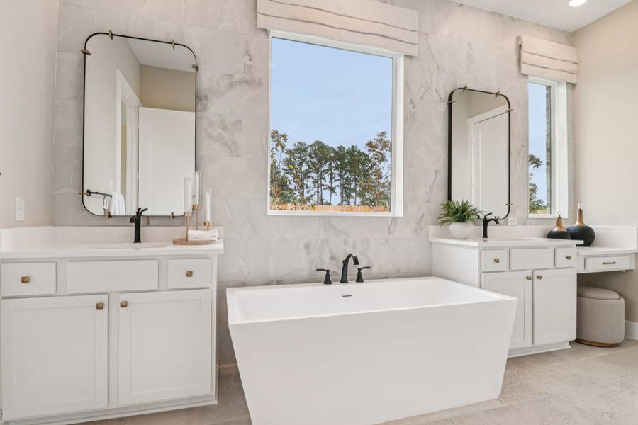 Representative furnished interior of a home built from the Lauren by Chesmar Homes in Grange, Katy (Image 18).