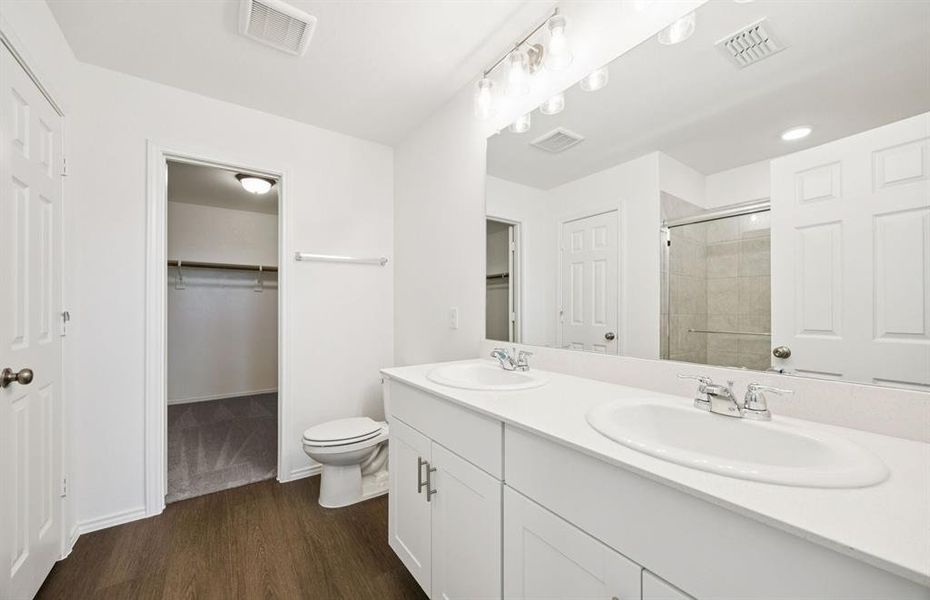 Owner's private bath with double sinks Owner's private bath with double sinks