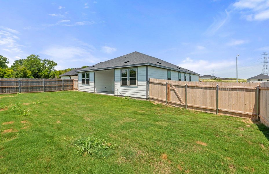 Front exterior of a new home in County View, Temple, TX, highlighting curb appeal (Image 20). Front exterior of a new home in County View, Temple, TX, highlighting curb appeal (Image 20).