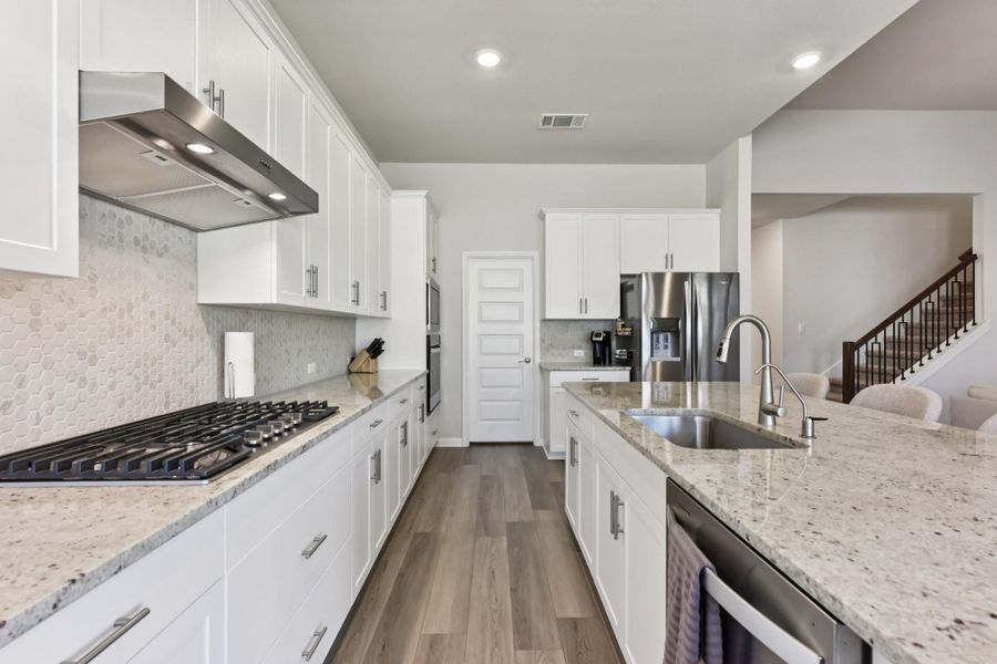 Furnished interior view inside a new home in Big Sky Ranch - Executive Collection, Dripping Springs (Image 11).