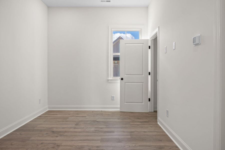 Spacious, unfurnished interior of a new home in The Domus Collection at Midtown Nexton, Summerville (Image 46).