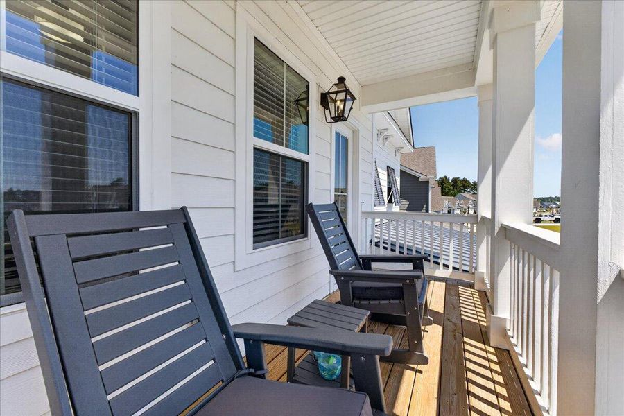 Exterior details and patio area of a home in Tidewater at Lakes of Cane Bay, Summerville (Image 27).