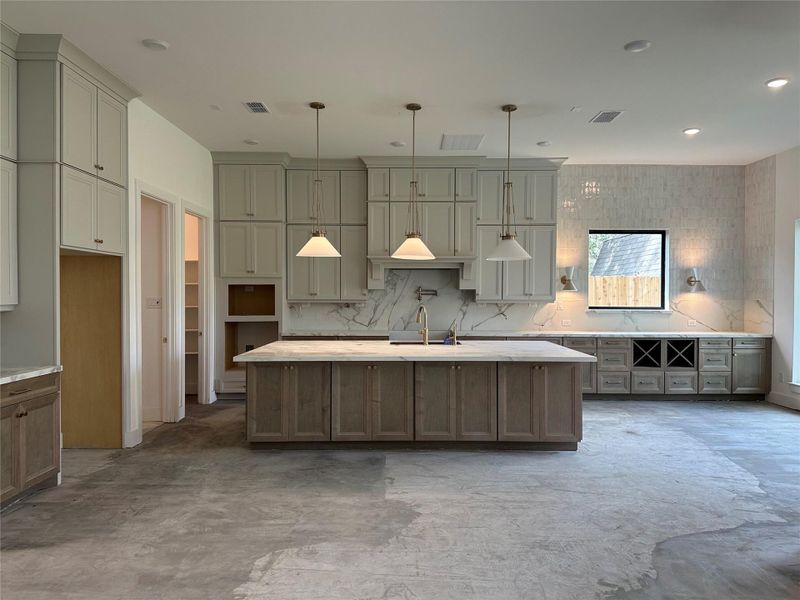 Floors will be engineered wood. Frigidaire Appliances to be installed