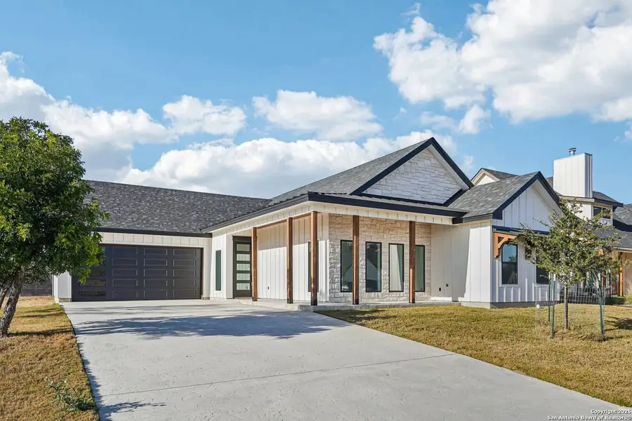 Front exterior of a new home in , Kerrville, TX, highlighting curb appeal (Image 2).