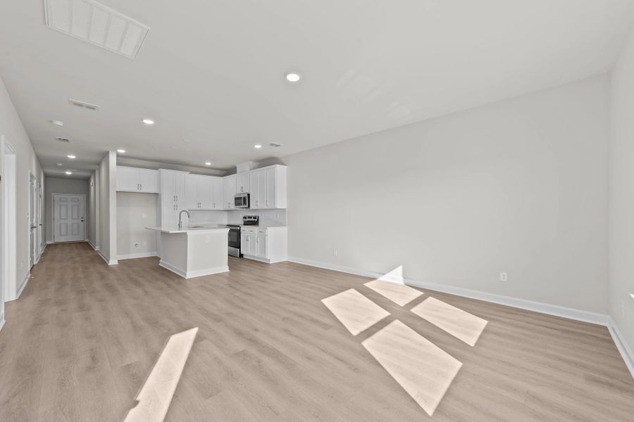 Spacious, unfurnished interior of a new home in Blue Heron Retreat: Villas, Little River (Image 18).