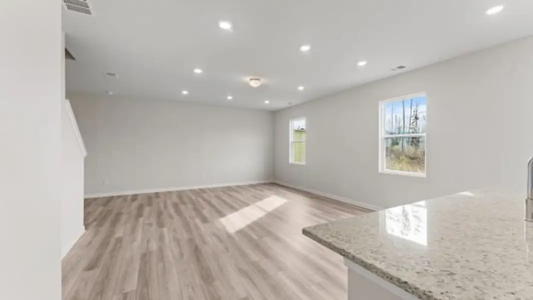 Representative unfurnished interior of a home built from the Bramblewood Townhome by Piedmont Residential in The Retreat at Browns Ridge, Newnan (Image 11).