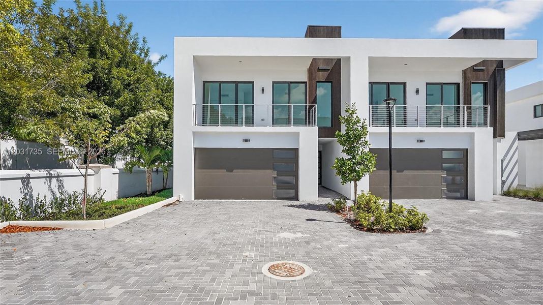 Front exterior of a new home in , Dania Beach, FL, highlighting curb appeal (Image 27).