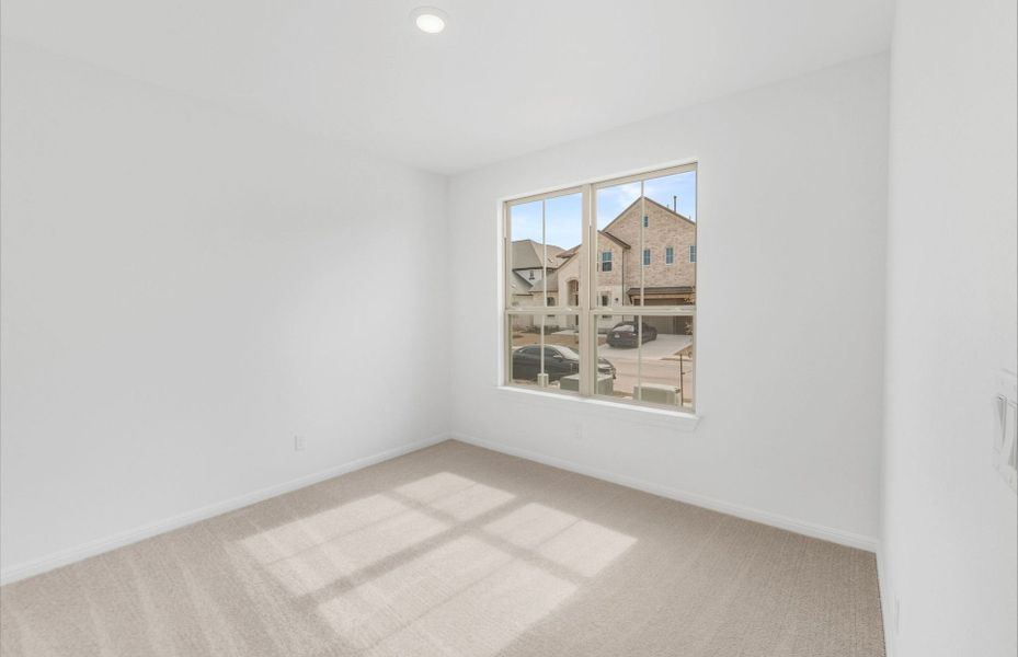 Spacious, unfurnished interior of a new home in Bluffview Reserve, Leander (Image 56).