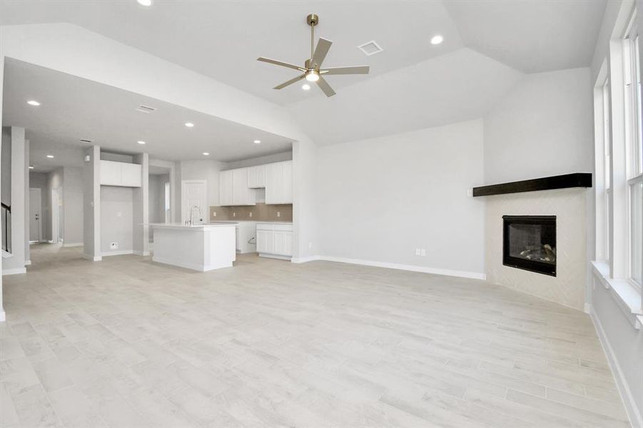 Another view of the family room where you can see how it seamlessly connects to the kitchen area!