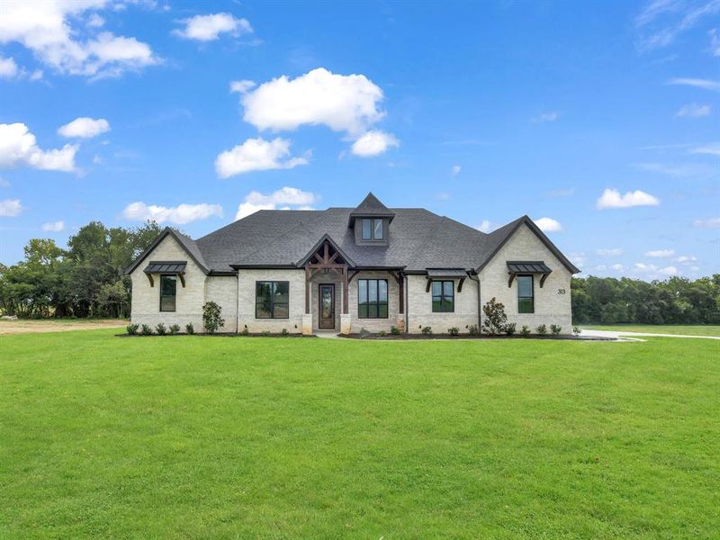 Front exterior of a new home in , Weatherford, TX, highlighting curb appeal (Image 1).