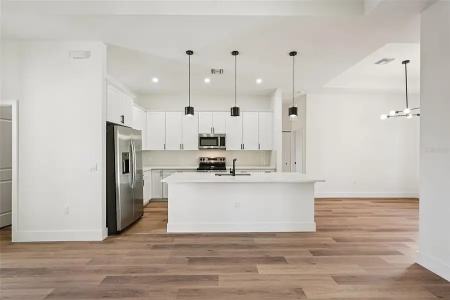 Furnished interior view inside a new home in , North Port (Image 10).