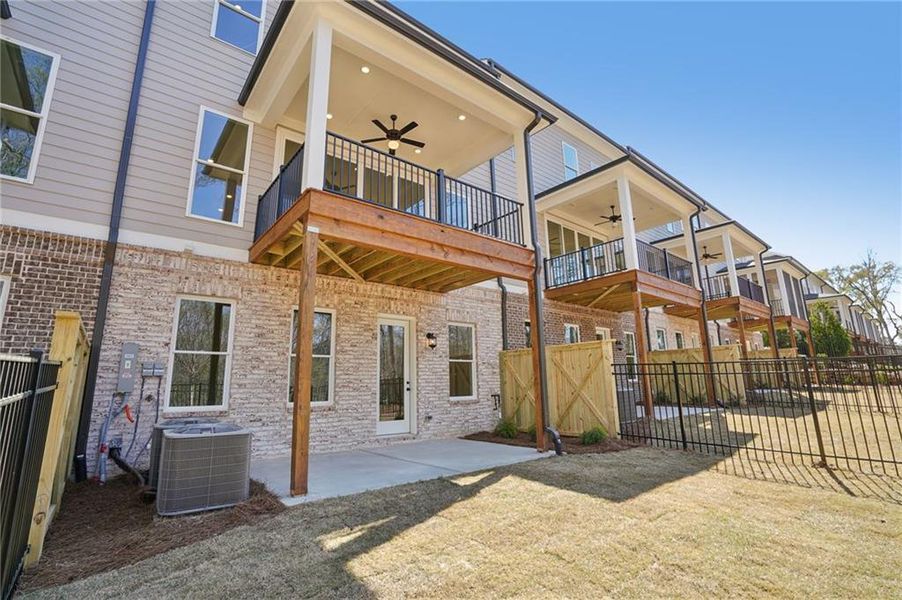 Exterior details and patio area of a home in Waterside Townhomes, Peachtree Corners (Image 4).