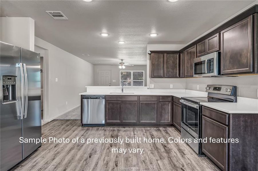 **Photos are sample photos of similar plan. Colors and features might vary** Fridge not included.