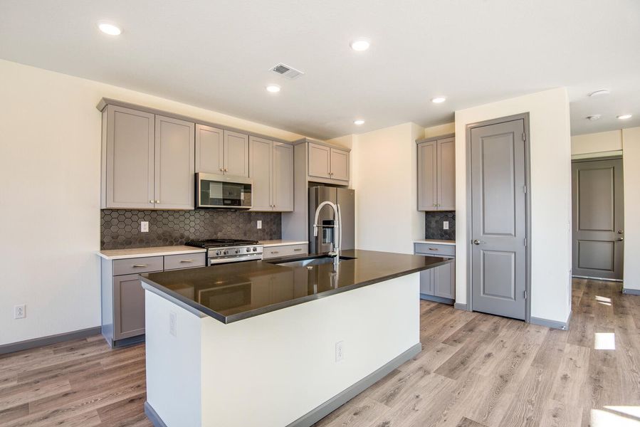 Representative furnished interior of a home built from the C by Tri Pointe Homes in Westside Crossing, Berthoud (Image 5).