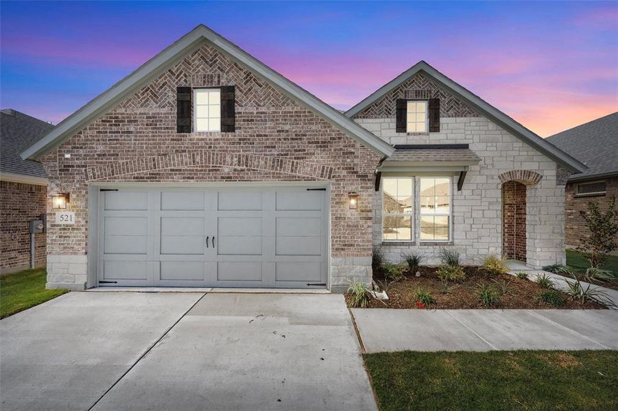 Front exterior of a new home in Morningstar, Aledo, TX, highlighting curb appeal (Image 1).
