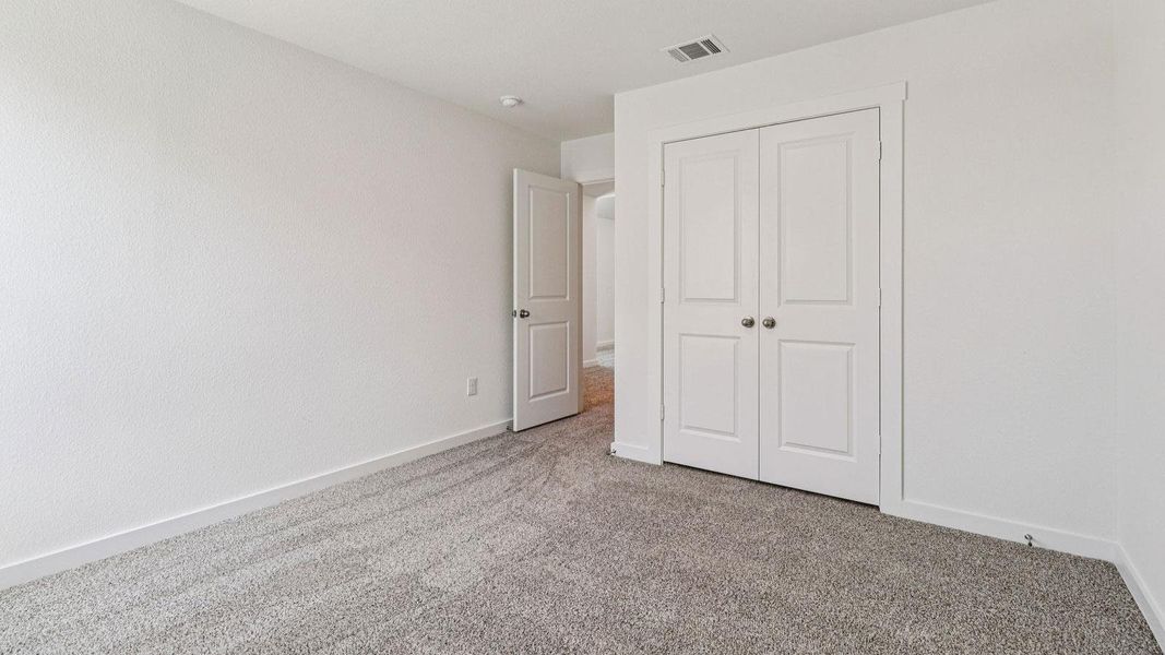 Spacious, unfurnished interior of a new home in Monarch Ranch, Manor (Image 24).