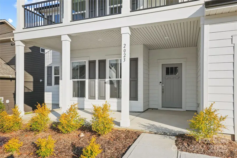 Exterior details and patio area of a home in Forest Creek, Waxhaw (Image 4).