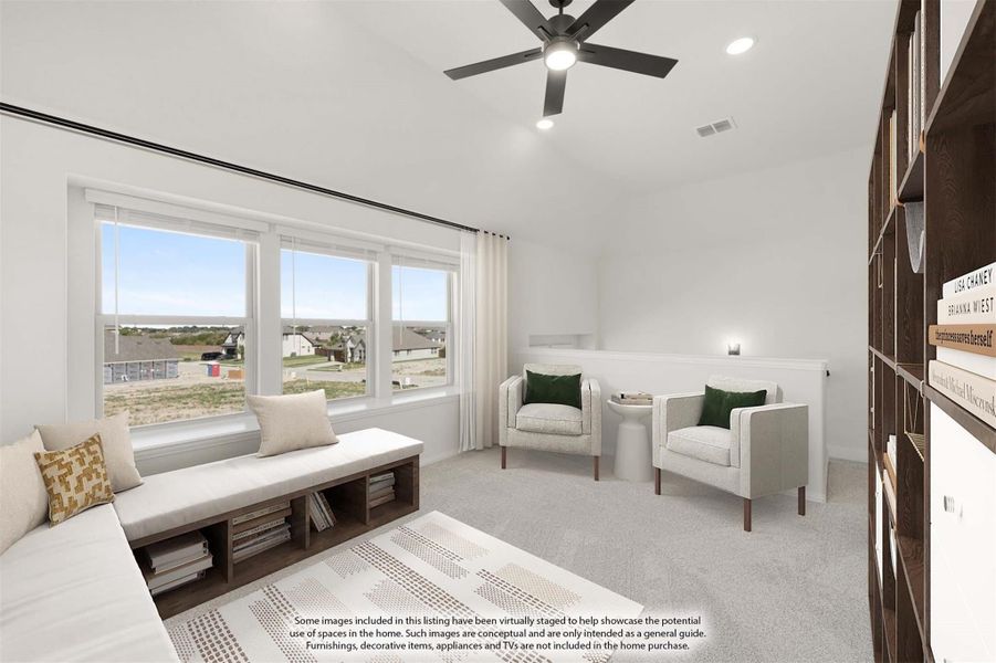 Sitting room with vaulted ceiling, ceiling fan, window bench, two armchairs, and built-in bookshelf Sitting room with vaulted ceiling, ceiling fan, window bench, two armchairs, and built-in bookshelf