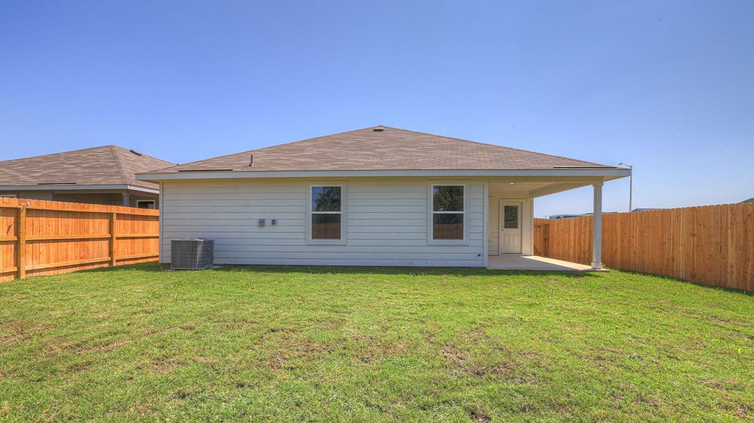 Front exterior of a new home in Navarro Fields, Seguin, TX, highlighting curb appeal (Image 20). Front exterior of a new home in Navarro Fields, Seguin, TX, highlighting curb appeal (Image 20).