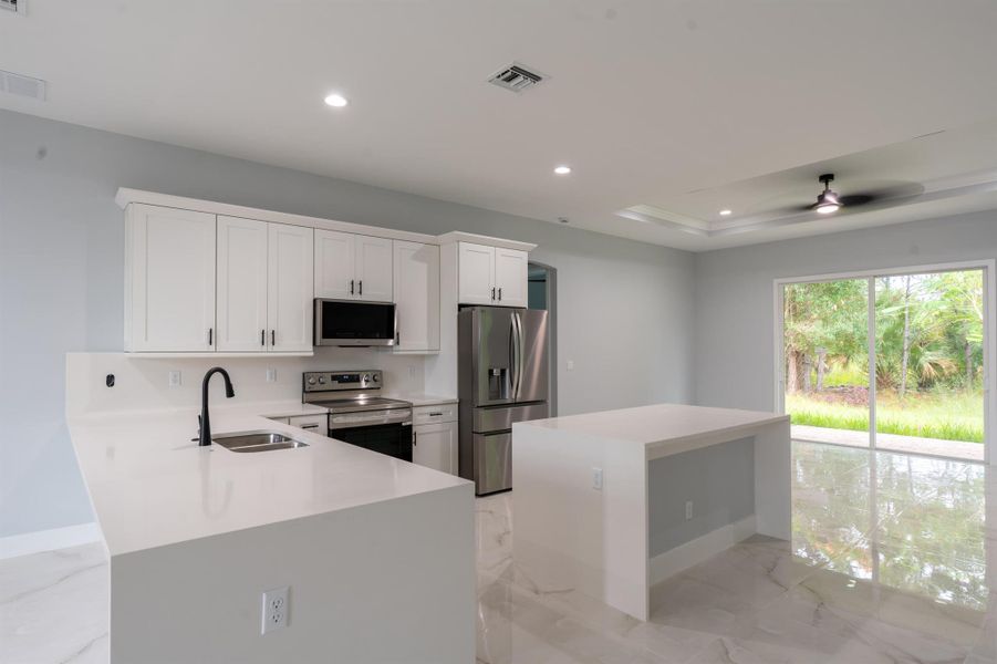 Furnished interior view inside a new home in , Port St. Lucie (Image 7).