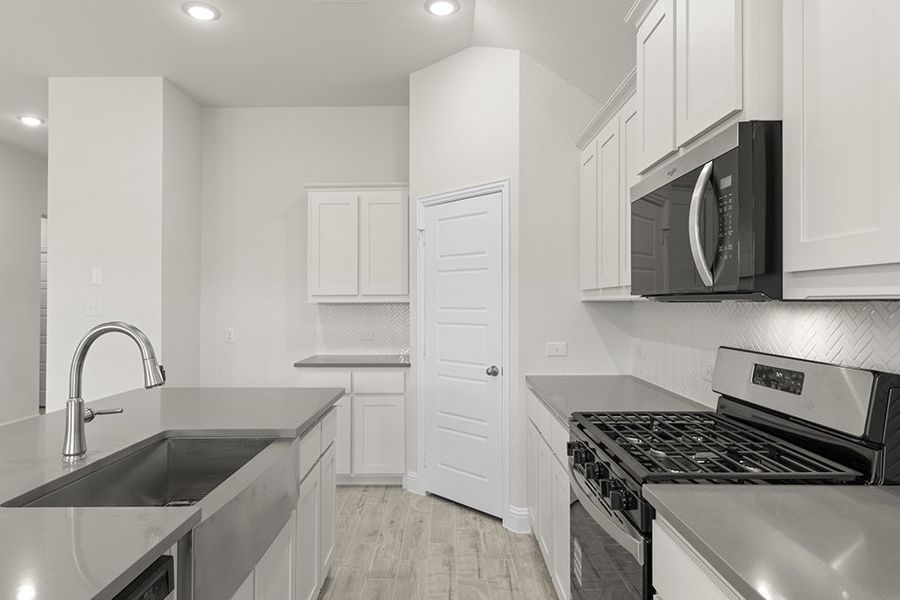 Representative exterior photo of a completed home built from the Derby by Impression Homes in Arcadia Trails, Balch Springs, TX (Image 9). Representative exterior photo of a completed home built from the Derby by Impression Homes in Arcadia Trails, Balch Springs, TX (Image 9).