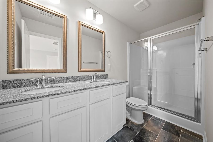 Representative furnished interior of a home built from the Palmetto II by McGuinn Homes in Clarke Townes, Anderson (Image 54).