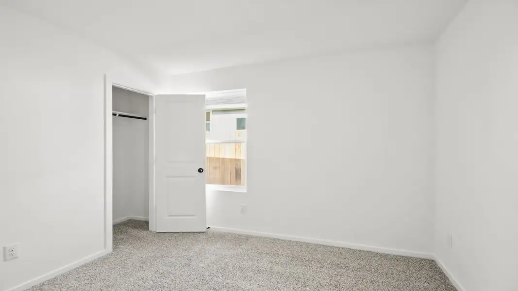 Spacious, unfurnished interior of a new home in The Canopies, Splendora (Image 12).