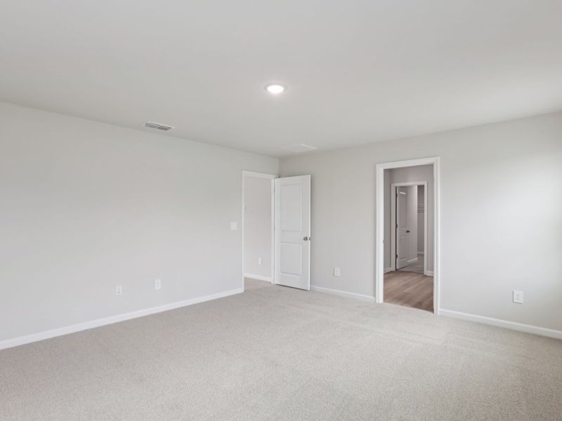 Spacious, unfurnished interior of a new home in River Glen, Angier (Image 18).