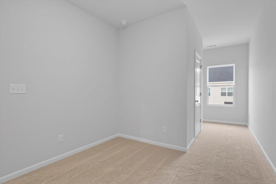 Spacious, unfurnished interior of a new home in Renaissance at White Oak, Garner (Image 24).