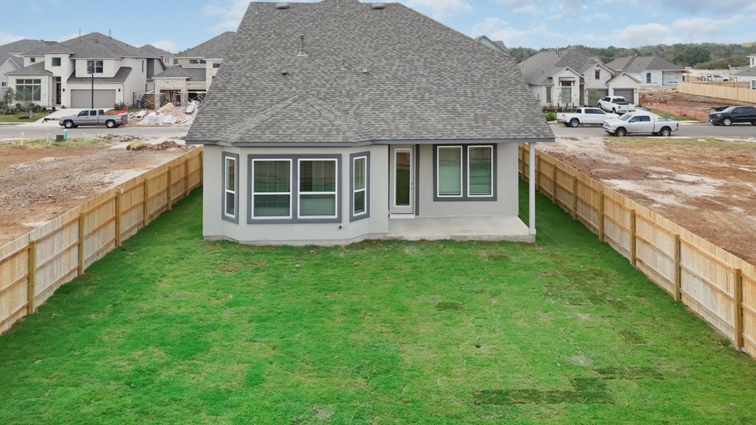Exterior details and patio area of a home in Highland Village, Georgetown (Image 4).