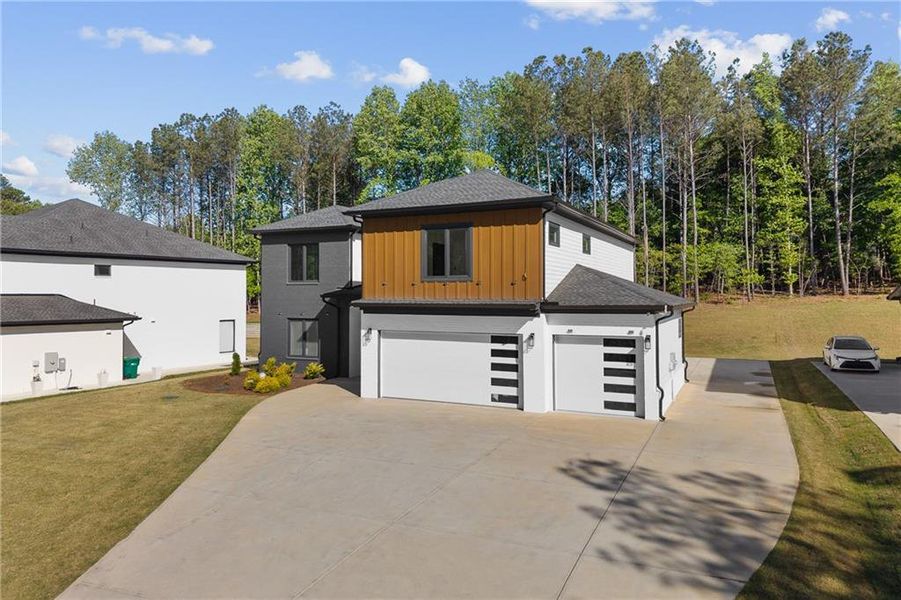 Front exterior of a new home in , Sugar Hill, GA, highlighting curb appeal (Image 25).