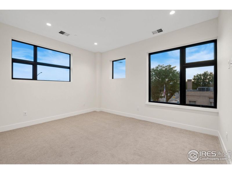 The best secondary bedroom in the building, with south and west facing views.