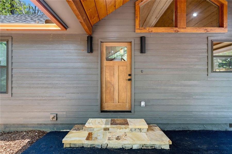 Exterior details and patio area of a home in , Ellijay (Image 33).