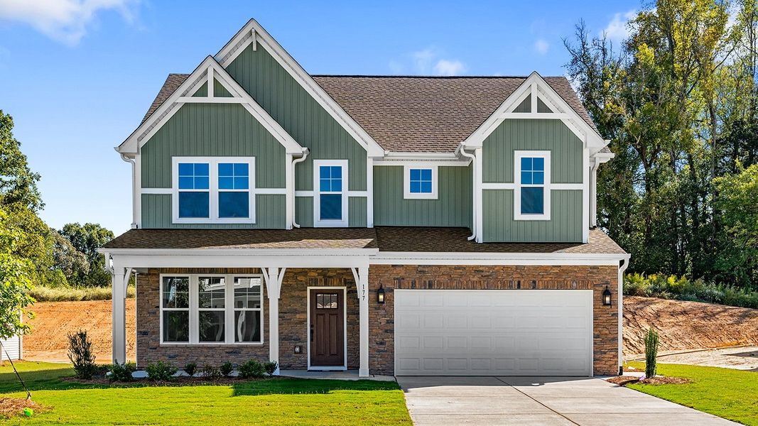 Front exterior of a new home in Fieldstone, Lexington, NC, highlighting curb appeal (Image 1).