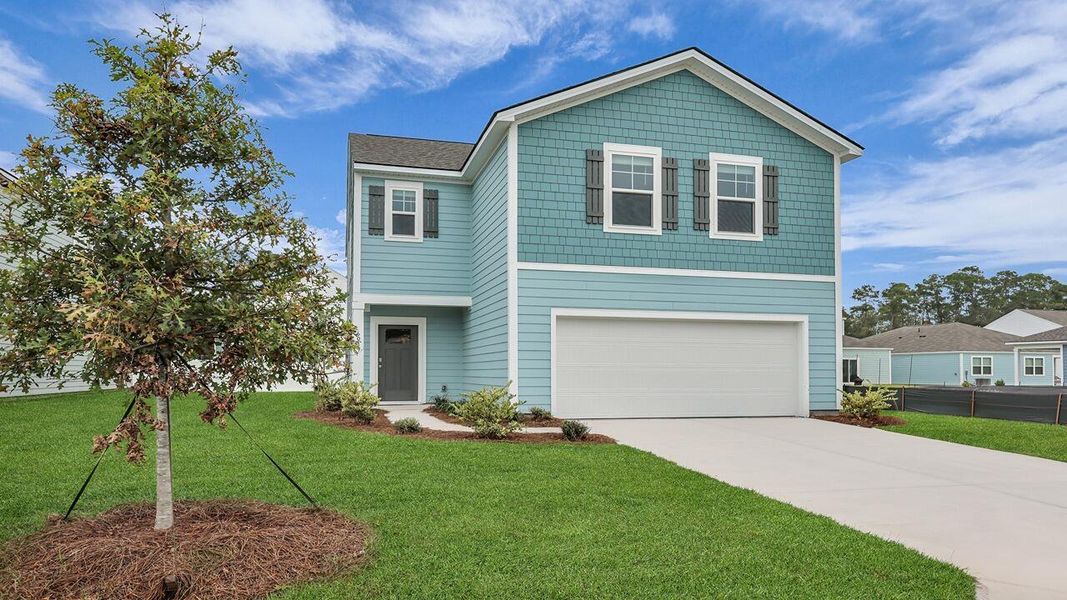 Front exterior of a new home in Hillcrest, Ravenel, SC, highlighting curb appeal (Image 20).