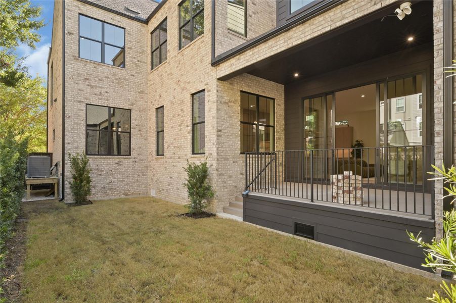 Exterior details and patio area of a home in , Houston (Image 3). Exterior details and patio area of a home in , Houston (Image 3).