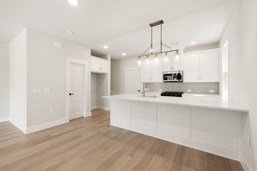 Furnished interior view inside a new home in Willow Grove Townhomes, Melissa (Image 11).