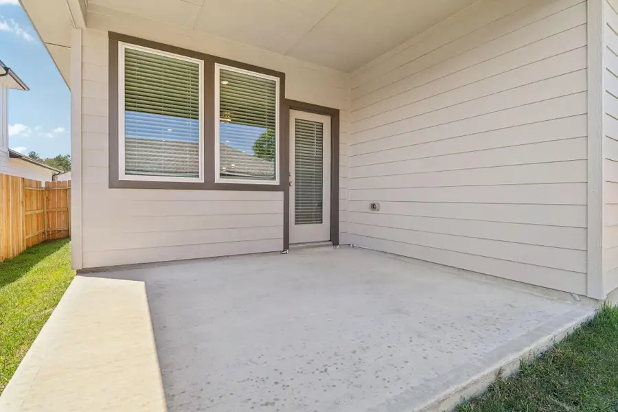 Exterior details and patio area of a home in Pine Lake Cove - Traditional Series, Montgomery (Image 3).