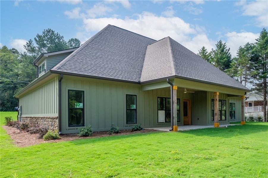 Front exterior of a new home in , Calhoun, GA, highlighting curb appeal (Image 20).