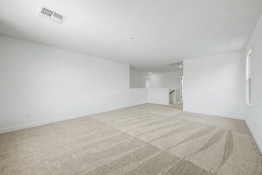 Spacious, unfurnished interior of a new home in Bentridge, Buckeye (Image 9).