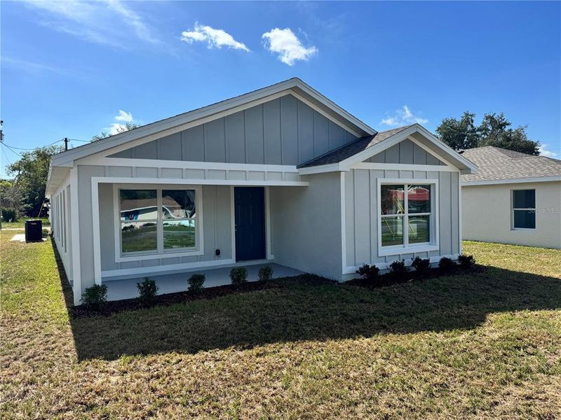 Front exterior of a new home in , Zephyrhills, FL, highlighting curb appeal (Image 24). Front exterior of a new home in , Zephyrhills, FL, highlighting curb appeal (Image 24).