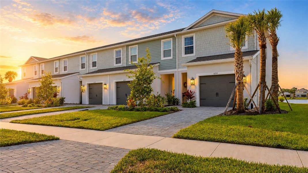 Front exterior of a new home in , Sarasota, FL, highlighting curb appeal (Image 22).