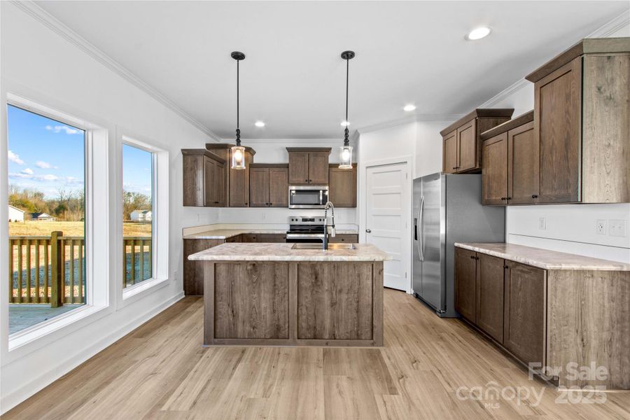 Furnished interior view inside a new home in , Statesville (Image 12).